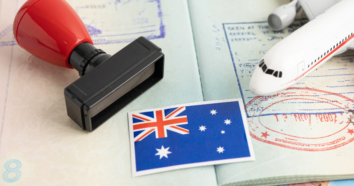 Calendar and Australian passport representing Australia visitor visa processing time from the UAE