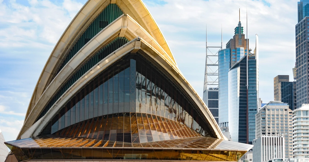 Three Australia visa routes for UAE residents represented by passports and boarding passes